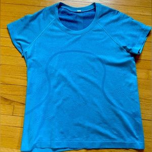 Lululemon Women’s size 10 short sleeve dri-fit shirt.